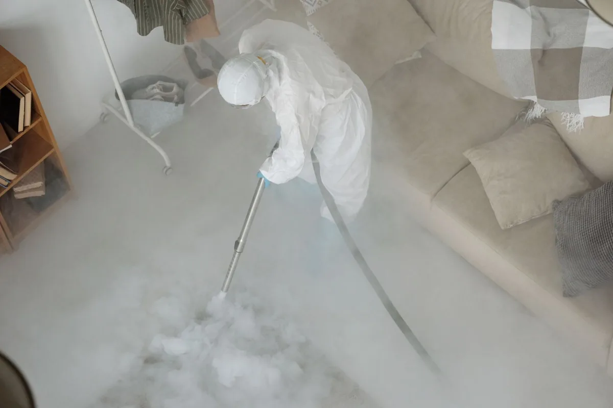 Biohazard cleanup technician in protective equipment, Gresham Park, GA